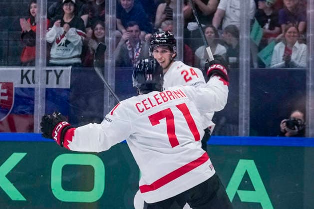 FRIBOURG, SWITZERLAND - MAY 24: Macklin Celebrini of Canada L) celebrates Dylan Cozens of Canada R) for his goal during the 2026 IIHF Ice hockey, Eishockey World Championship, WM, Weltmeisterschaft Switzerland game between Slovakia and Canada at BCF Arena on May 24, 2026 in Fribourg, Fribourg. Fribourg BCF Arena Fribourg Switzerland Copyright: xJustPictures.ch JarixPestelaccix jp-en-EuSpIm-JP6_JAR_Slovakia_Canada_24May2026_00063