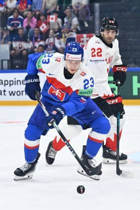 L-R Adam Liska (SVK) and Evan Bouchard (CAN) in action during to the group B match of the World Ice hockey, Eishockey Championship, Slovakia - Canada, Fribourg, Switzerland, on May 24, 2026. (CTKxPhoto RadekxPetrasek) CTKPhotoP2026052406443  CTKPhotoP2026052406443