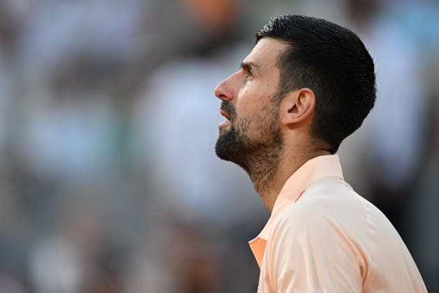 French Open (Roland Garros) - Day 1 PARIS, FRANCE - MAY 24: Serbia s Novak Djokovic in action against France s Giovanni Mpetshi Perricard (not seen) during a first-round men s singles match on the opening day of the French Open (Roland Garros) in Paris, France, on May 24, 2026. Burak Akbulut Anadolu Paris France. Editorial use only. Please get in touch for any other usage.  Copyright: x2026xAnadoluxBurakxAkbulutx