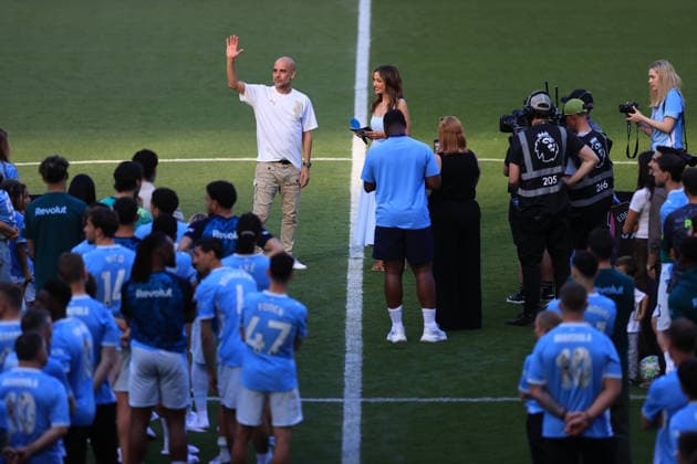 Football - Premier League - Manchester City v Aston Villa 24th May 2026 - Premier League - Manchester City v Aston Villa - Manchester City manager Pep Guardiola waves to the crowd as he is interviewed by presenter Natalie Pike after the match - Photo: Simon Stacpoole Offside. Manchester UK Copyright: xSimonxStacpoolexOffside