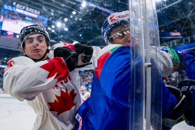 FRIBOURG, SWITZERLAND - MAY 24: Porter Martone of Canada L) against Viliam Kmec of Slovakia R) during the 2026 IIHF Ice hockey, Eishockey World Championship, WM, Weltmeisterschaft Switzerland game between Slovakia and Canada at BCF Arena on May 24, 2026 in Fribourg, Fribourg. Fribourg BCF Arena Fribourg Switzerland Copyright: xJustPictures.ch JarixPestelaccix jp-en-EuSpIm-JP6_JAR_Slovakia_Canada_24May2026_00016