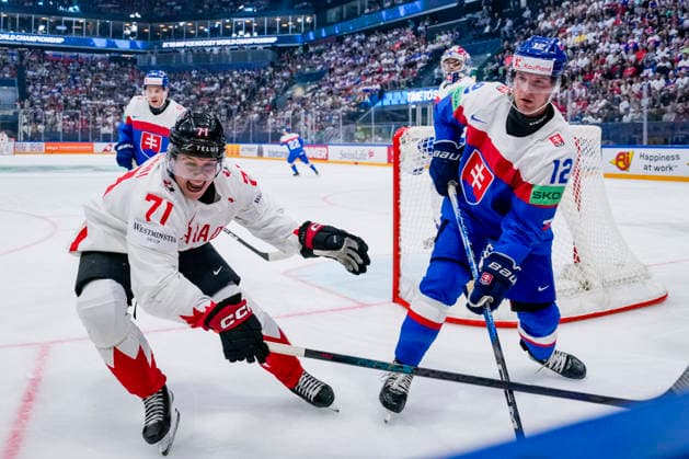 FRIBOURG, SWITZERLAND - MAY 24: Macklin Celebrini of Canada L) against Samuel Knazko of Slovakia R) during the 2026 IIHF Ice hockey, Eishockey World Championship, WM, Weltmeisterschaft Switzerland game between Slovakia and Canada at BCF Arena on May 24, 2026 in Fribourg, Fribourg. Fribourg BCF Arena Fribourg Switzerland Copyright: xJustPictures.ch JarixPestelaccix jp-en-EuSpIm-JP6_JAR_Slovakia_Canada_24May2026_00042