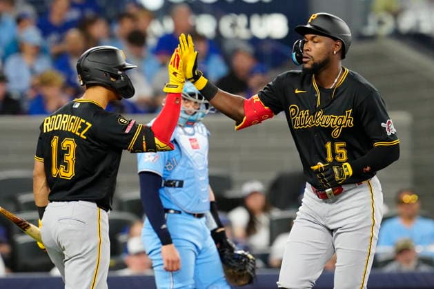 May 25, 2026, Toronto, On, Canada: Pittsburgh Pirates centre fielder Oneil Cruz (15) celebrates his home run with teammate Endy RodroÂ­guez (13) during second inning MLB, Baseball Herren, USA baseball action against the Toronto Blue Jays in Toronto on Sunday, May 24, 2026. Canada News - May 25, 2026  - ZUMAc35_ 20260525_zaf_c35_014 Copyright: xFrankxGunnx