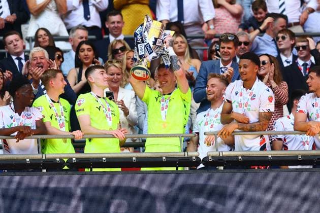Jack Bonham of Bolton Wanderers lifts the Sky Bet League One Play Off Trophy Bolton Wanderers v Stockport County, EFL Sky Bet League One, Play-Off Final, Football, Wembley Stadium, London, UK - 24 May 2026London Wembley Stadium United Kingdom EDITORIAL USE ONLY No use with unauthorised audio, video, data, fixture lists, club league logos or live services. Online in-match use limited to 120 images, no video emulation. No use in betting, games or single club league player publications.  Copyright: xPaulxCurrie Shutterstockx 16889803hd
