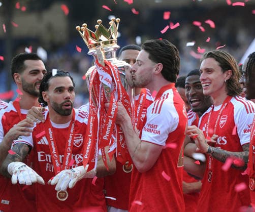 Football - 2025 2026 Premier League - Crystal Palace vs. Arsenal - Selhurst Park - Sunday 24th May 2026 Declan Rice of Arsenal kisses the Premier League trophy 