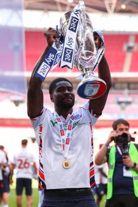 London, England, 24th May 2026. Richard Taylor of Bolton Wanderers lifts the trophy following victory during the Bolton Wanderers vs Stockport County Sky Bet League 1 play off final match at Wembley Stadium, London. Picture credit should read: Jake Youle Sportimage EDITORIAL USE ONLY. No use with unauthorised audio, video, data, fixture lists, club league logos or live services. Online in-match use limited to 120 images, no video emulation. No use in betting, games or single club league player publications. SPI_064_JY_Stockport_County_Bolton_Wanderers SPI-4821-0064