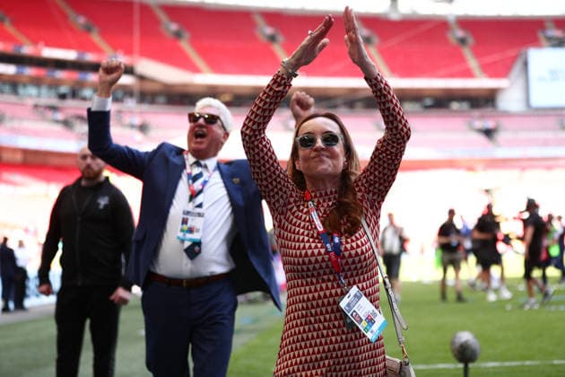 London, England, 24th May 2026. Sharon Brittan chairperson of Bolton Wanderers and Michael James co-owner of Bolton Wanderers celebrate victory with the fans during the Bolton Wanderers vs Stockport County Sky Bet League 1 play off final match at Wembley Stadium, London. Picture credit should read: Jake Youle Sportimage EDITORIAL USE ONLY. No use with unauthorised audio, video, data, fixture lists, club league logos or live services. Online in-match use limited to 120 images, no video emulation. No use in betting, games or single club league player publications. SPI_065_JY_Stockport_County_Bolton_Wanderers SPI-4821-0065