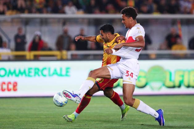 Walid Cheddira of US Lecce and Sebastian Otoa of Genoa CFC compete for the ball during the serie A match between US Lecce and Genoa CFC at Ettore Giardiniero - Via del Mare stadium in Lecce (Italy), May 24, 2026. massimilianoxcarnabuci