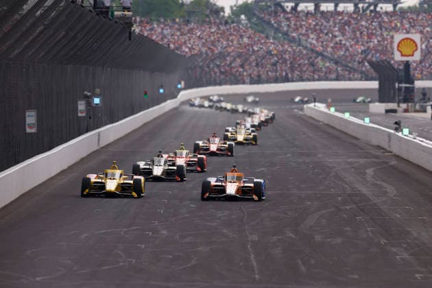 INDIANAPOLIS, IN - MAY 24: Scott Dixon, Scott Dixon of the 9 PNC Bank Chip Ganassi Racing Honda and Alex Palou, Alex Palou of the 10 DHL Chip Ganassi Racing Honda exchange leading the race during the NTT IndyCar, Indy Car, IRL, USA Series Indianapolis 500 presented by Gainbridge on May 24, 2026 at Indianapolis Motor Speedway at the Indianapolis, IN. (Photo by Jeffrey Brown Icon Sportswire) AUTO: MAY 24 NTT IndyCar Series Indianapolis 500 presented by Gainbridge EDITORIAL USE ONLY Icon052426016500