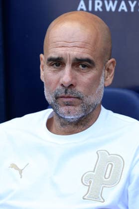 24th May 2026; Etihad Stadium, Manchester, Lancashire, England; Premier League Football, Manchester City versus Aston Villa; Manchester City manager Pep Guardiola looks on from his seat in the dugout DavidxBlunsden