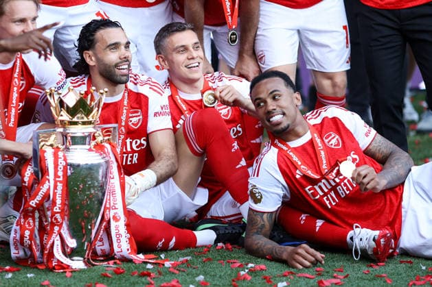 Crystal Palace v Arsenal 24 May 2026, London - Premier League Football - Crystal Palace v Arsenal - Arsenal goalkeeper David Raya, Leandro Trossard of Arsenal and Gabriel of Arsenal alongside the Premier League trophy - Photo: Jacques Feeney Offside. London UK Copyright: xJacquesxFeeneyx xOffsidexOffside