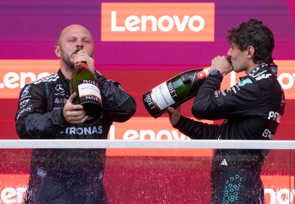 May 24, 2026, Montreal, Qc, CANADA: Mercedes driver Kimi Antonelli of Italy, right, drinks champagne with Mercedes senior composite technician Dean Hale following his win of Formula One auto racing Canadian Grand Prix in Montreal on Sunday, May 24, 2026. Canada News - May 24, 2026  - ZUMAc35_ 20260524_zaf_c35_121 Copyright: xChristinnexMuschix