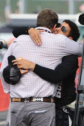 CHARLOTTE, NC - MAY 24: NASCAR, Motorsport, USA Executive Director,Drivers Advisory Council Chip Wile hugs Bubba Wallace ( 23 23XI Racing Columbia Toyota) in the garage area prior to the running of the NASCAR Cup Series Coca-Cola 600 on May 24, 2026 at Charlotte Motor Speedway in Charlotte, NC. (Photo by Jeff Robinson Icon Sportswire) AUTO: MAY 24 NASCAR Cup Series Coca-Cola 600 EDITORIAL USE ONLY Icon2605246137600
