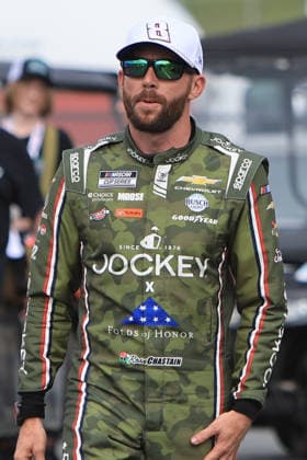 CHARLOTTE, NC - MAY 24: Ross Chastain ( 1 TrackHouse Racing Jockey x Folds of Honor Chevrolet) walks in the garage area wearing a Hat and honoring the late Kyle Busch prior to the running of the NASCAR, Motorsport, USA Cup Series Coca-Cola 600 on May 24, 2026 at Charlotte Motor Speedway in Charlotte, NC. (Photo by Jeff Robinson Icon Sportswire) AUTO: MAY 24 NASCAR Cup Series Coca-Cola 600 EDITORIAL USE ONLY Icon2605246218600