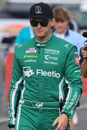 CHARLOTTE, NC - MAY 24: Corey Heim ( 67 23XI Racing Fleetio Toyota) walks in the garage area wearing a Hat honoring the late Kyle Busch prior to the running of the NASCAR, Motorsport, USA Cup Series Coca-Cola 600 on May 24, 2026 at Charlotte Motor Speedway in Charlotte, NC. (Photo by Jeff Robinson Icon Sportswire) AUTO: MAY 24 NASCAR Cup Series Coca-Cola 600 EDITORIAL USE ONLY Icon2605246264600