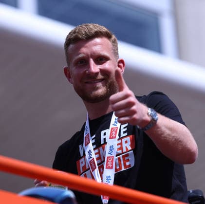 Hull Bus Parade Hull City goalkeeper Dillon Phillips on one of the buses outside the MKM Stadium before the Hull City Bus Parade on the streets of Hull, England after being promoted to the Premier League in the Sky Bet Championship Play-Off Final on Saturday 23rd May 2026. 25 05 2026 UK Newspapers OUT Copyright: xAndyxSumnerx FIL-23472-0065