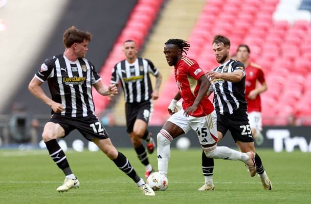 Rosaire Longelo of Salford City in action against Lucas Ness (left) and Nicholas Tsaroulla of Notts County (right) Notts County v Salford City, EFL Sky Bet League Two, Play-Off Final, Football, Wembley Stadium, London, UK - 25 May 2026London Wembley Stadium United Kingdom EDITORIAL USE ONLY No use with unauthorised audio, video, data, fixture lists, club league logos or live services. Online in-match use limited to 120 images, no video emulation. No use in betting, games or single club league player publications. Copyright: xSimonxDael Shutterstockx 16889935cd
