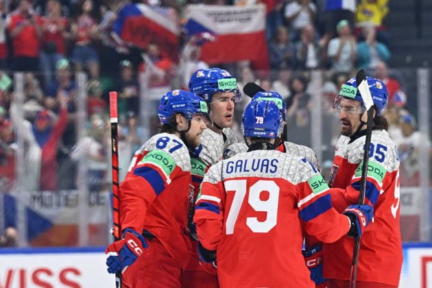 From left Michal Kovarcik, Tomas Galvas and Daniel Vozenilek of Czech Republic celebrate a goal during the IIHF World Championship, WM, Weltmeisterschaft Group B match Czech Republic vs Norway on May 25, 2026, Fribourg, Switzerland. (CTKxPhoto RadekxPetrasek) CTKPhotoP2026052505538  CTKPhotoP2026052505538