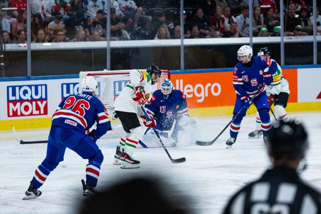 ZURICH, SWITZERLAND - MAY 25: Janos Hari (Hungary, 16) in front of Joseph Woll (United States, 60) during the Preliminary Round - Group A Match 47 between United States and Hungary at the IIHF Ice hockey, Eishockey World Championship, WM, Weltmeisterschaft 2026, Swiss Life Arena on May 25, 2026 in Zurich, Switzerland. Zurich Switzerland Copyright: xTimoxSteinx