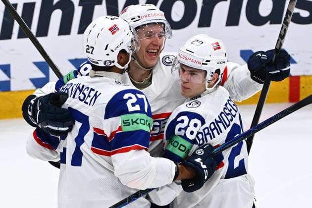 From left Andreas Martinsen, Kristian Ostby and Michael Brandsegg-Nygard of Norway celebrate a goal during the IIHF World Championship, WM, Weltmeisterschaft Group B match Czech Republic vs Norway on May 25, 2026, Fribourg, Switzerland. (CTKxPhoto RadekxPetrasek) CTKPhotoP2026052506195  CTKPhotoP2026052506195