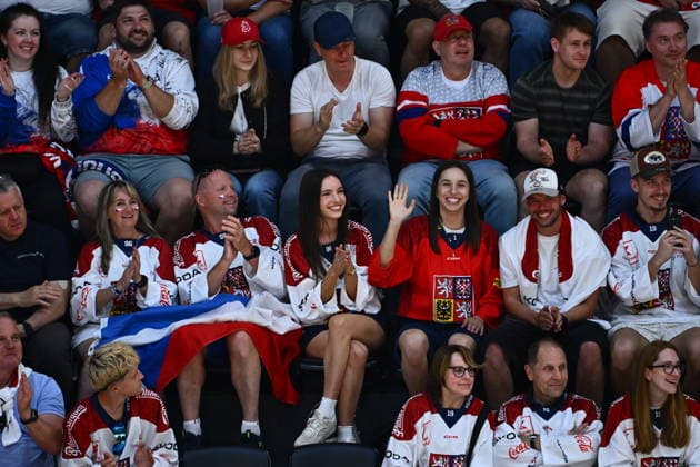 Olympic gold medalist Czech snowboarder Zuzana Maderova, in red, among Czech fans during the IIHF World Championship, WM, Weltmeisterschaft Group B match Czech Republic vs Norway on May 25, 2026, Fribourg, Switzerland. (CTKxPhoto RadekxPetrasek) CTKPhotoP2026052506270  CTKPhotoP2026052506270