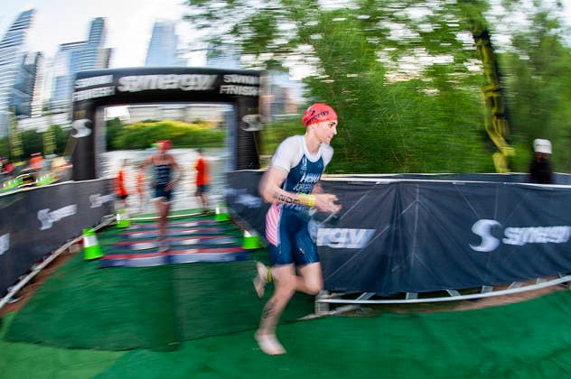 May 25, 2026: Gwen Jorgensen (203) finishing the swim at Lady Bird Lake, runs to bike transition in the womens Pro Sprint at the SuperTri. Austin, Texas. CSM. Triathlon 2026: SuperTri Austin MAY 25  - ZUMAc04_ 20260525_faf_c04_002 Copyright: xMarioxCantux