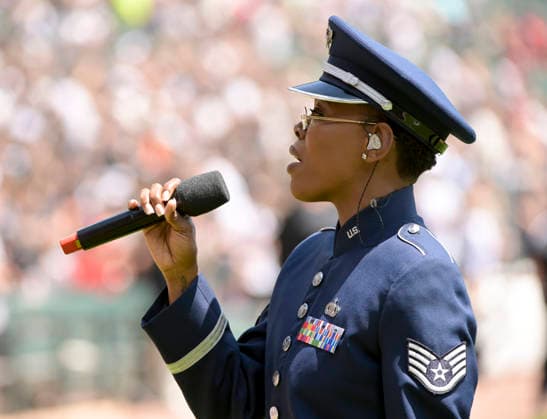 Staff Sgt Melan Smartt of the USAF sings the National Anthem before the Chicago White Sox take on the Minnesota Twins at Rate Field in Chicago, IL on Monday, May 25, 2026.  CHI20260525125 MARKxBLACK