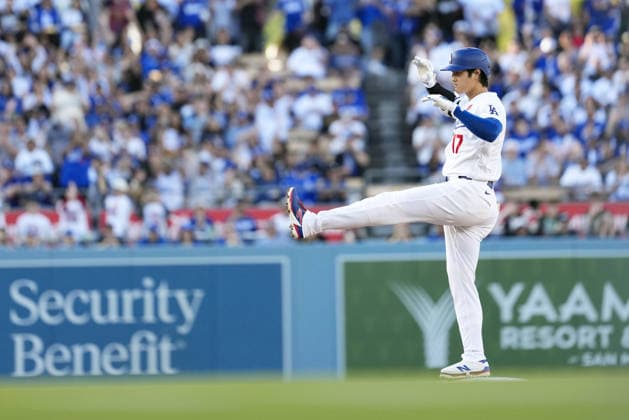 Baseball: Rockies vs. Dodgers Los Angeles Dodgers designated hitter Shohei Ohtani poses at second base after hitting a double in the first inning of a baseball game against the Colorado Rockies at Dodger Stadium in Los Angeles on May 25, 2026.  A14AA0005611864P