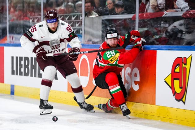 Ice hockey, Eishockey - IIHF WC 2026 ZURICH,SWITZERLAND,26.MAY.26 - ICE HOCKEY - IIHF Ice Hockey World Championship, WM, Weltmeisterschaft 2026, group stage, Hungary vs Latvia. Image shows Oskars Batna (LAT) and Gabor Tornyai (HUN).  GEPAxpictures xMaticxKlansek
