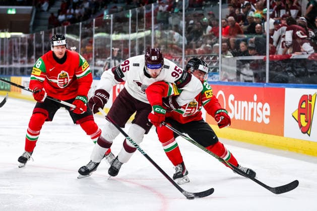 Ice hockey, Eishockey - IIHF WC 2026 ZURICH,SWITZERLAND,26.MAY.26 - ICE HOCKEY - IIHF Ice Hockey World Championship, WM, Weltmeisterschaft 2026, group stage, Hungary vs Latvia. Image shows Oskars Batna (LAT) and Gabor Tornyai (HUN).  GEPAxpictures xMaticxKlansek