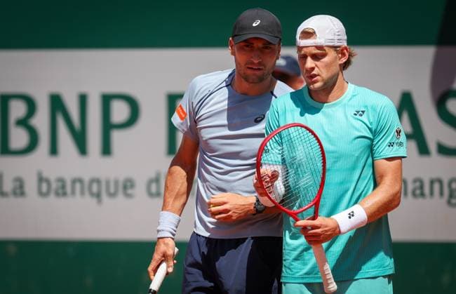 Belgian Raphael Collignon and Belgian Zizou Bergs picture during a first round match in the men s doubles between Belgian pair Bergs-Collignon and Belgian-Dutch pair Gille-Verbeek at the Roland Garros French Open tennis tournament, in Paris, France, Tuesday 26 May 2026. This year s tournament takes place from 18 May to 07 June. VIRGINIExLEFOUR  x175097009x
