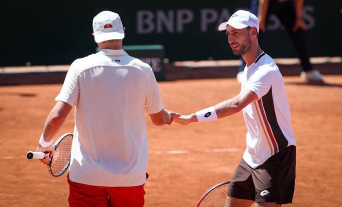 Belgian Sander Gille celebrates during a first round match in the men s doubles between Belgian pair Bergs-Collignon and Belgian-Dutch pair Gille-Verbeek at the Roland Garros French Open tennis tournament, in Paris, France, Tuesday 26 May 2026. This year s tournament takes place from 18 May to 07 June. VIRGINIExLEFOUR  x175097032x