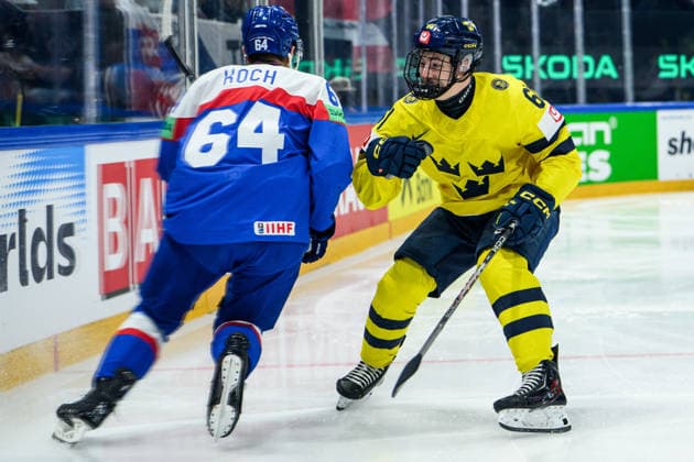 260526 Patrik Koch of Slovakia and Viggo Björck of Sweden during the 2026 IIHF Ice hockey, Eishockey World Championship, WM, Weltmeisterschaft match between Sweden and Slovakia on May 26, 2026 in Fribourg. Photo: Jesper Zerman BILDBYRAN kod JZ JZ0730 ishockey ice hockey ishockey-vm 2026 vm 2026 iihf world championship sverige sweden slovakien slovakia bbeng Copyright: JESPERxZERMAN BB260526JZ034