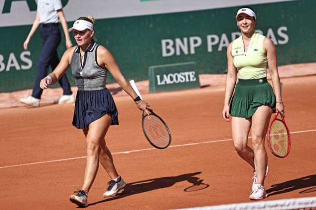 Eva Lys, GER (green), and Peyton Stearns, USA (blue), during 2026 French Open womens doubles at Roland Garros, Paris, 26 05 2026; -