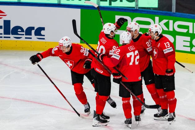 ZURICH, SWITZERLAND - MAY 26: Atillio Biasca (Switzerland, 94) during his 1:0 goal celebration with the team during the Preliminary Round - Group A Match 55 between Switzerland and Finland at the IIHF Ice hockey, Eishockey World Championship, WM, Weltmeisterschaft 2026, Swiss Life Arena on May 26, 2026 in Zurich, Switzerland. Zurich Switzerland Copyright: xTimoxSteinx