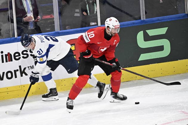 LKS 20260526 Patrik Puistola (L) of Finland vies with Roman Josi of Switzerland during the 2026 IIHF Ice hockey, Eishockey World Championships preliminary round group A match between Switzerland and Finland in Zurich on May 26, 2026. - RONI REKOMAA Zürich Switzerland poSjyXkTryY  Copyright: xRonixRekomaax poSjyXkTryY