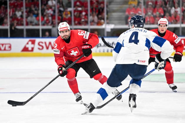 ZURICH, SWITZERLAND - MAY 26: Denis Malgin of Switzerland in action against Mikko Lehtonen of Finland during the 2026 IIHF Ice hockey, Eishockey World Championship, WM, Weltmeisterschaft Switzerland game between Switzerland and Finland at Swiss Life Arena on May 26, 2026 in Zurich, Zurich. Zurich Swiss Life Arena Zurich Switzerland Copyright: xJustPictures.ch AndreaxBrancax jp-en-EuSpIm-JP7_ANB_SuiFin_26052026_7813