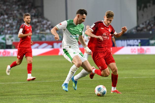 Relegation, SpVgg Greuther Fuerth vs. Rot-Weiss Essen Football, 2nd Bundesliga Relegation, SpVgg Greuther Fuerth vs. Rot-Weiss Essen 26 May 2026 Sportpark Ronhof Thomas Sommer, Fuerth, Germany Image: (fLTR) BraÅ imir Hrgota (Fürth), Tobias Kraulich (Essen) DFL regulations prohibit any use of photographs as image sequences and or quasi-video. Copyright: xPresseFotoxEvansx xRyanxEvansx