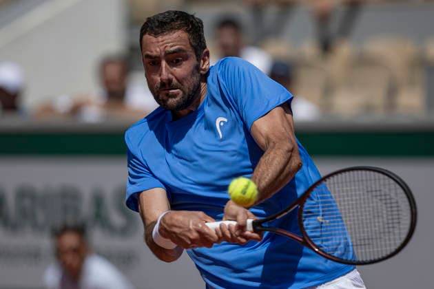 2026 French Open - Day Three Marin Cilic returns the ball against Moise Kouame during the Roland Garros Grand Slam Tournament on Day 03 in Paris, France, on May 26, 2026. Paris France  Copyright: xRobertxSzaniszlox originalFilename:szaniszlo-notitle260526_npo63.jpg