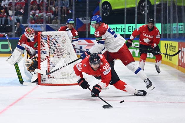 Ryan O Reilly of Canada, left, and Libor Hajek of Czech Republic in action during the IIHF World Championship, WM, Weltmeisterschaft Group B match Czech Republic vs Canada on May 26, 2026, Fribourg, Switzerland. (CTKxPhoto RadekxPetrasek) CTKPhotoP2026052609083  CTKPhotoP2026052609083