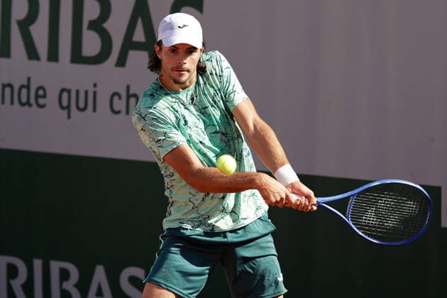 French Open - Jaime Faria (POR) plays a backhand during at the 2026 Roland-Garros tournament in Paris, FRANCE, on May 26 - 2026 Copyright: AntonioxBorga