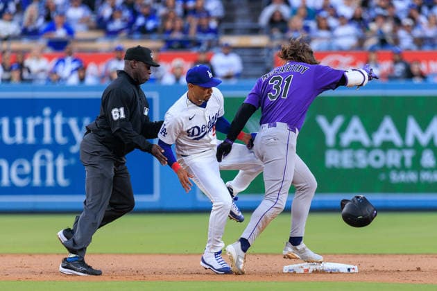 May 26, 2026, Los Angeles, California, USA: Jake McCarthy 31 of the Colorado Rockies clashes with Mookie Betts 50 of the Los Angeles Dodgers after being tagged out in second base during a regular season MLB, Baseball Herren, USA game on Tuesday May 26, 2026 at Dodger Stadium in Los Angeles, California. Dodgers defeat Rockies, 15-6. JAVIER ROJAS PI Los Angeles USA - ZUMAp124 20260526_zaa_p124_041 Copyright: xJavierxRojasx