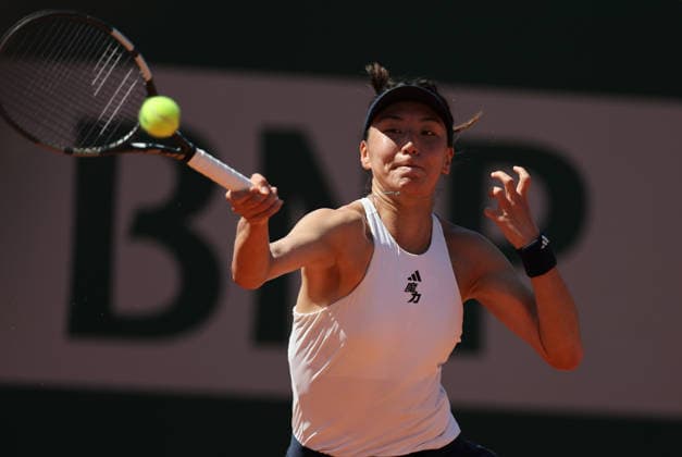 (260527) -- PARIS, May 27, 2026 -- Wang Xinyu hits a return during the women s singles second round match between Tamara Korpatsch of Germany and Wang Xinyu of China at the French Open tennis tournament in Paris, France, May 27, 2026. ) (SP)FRANCE-PARIS-TENNIS-FRENCH OPEN-WOMEN S SINGLES-2ND ROUND WuxHuiwo 