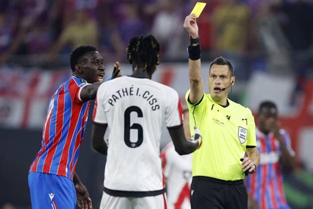 LEIPZIG - (lr) PathÃ Ciss of Rayo Vallecano de Madrid, referee Maurizio Mariani during the UEFA Conference League final between Crystal Palace FC and Rayo Vallecano de Madrid at the Leipzig Arena on 27 May 2026 in Leipzig, Germany. MAURICE VAN STEEN ANP UEFA Conference League - FINAL 2025-2026 xVIxANPxSportx xMauricexvanxSteenxIVx 559463262 originalFilename: 559463262.jpg