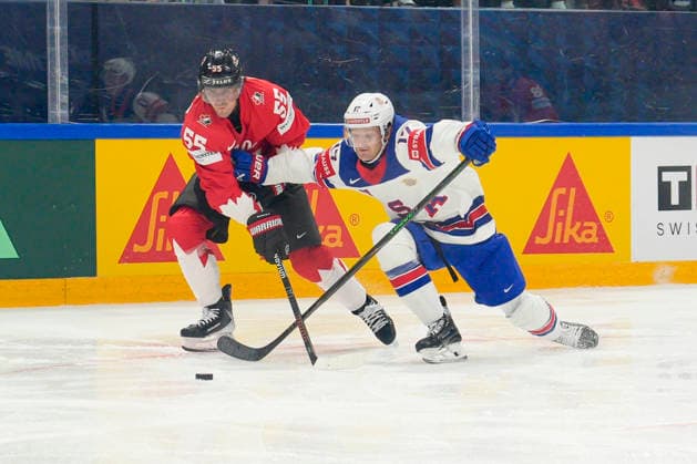 FRIBOURG, SWITZERLAND - MAY 28: Mark Scheifele of Canada L) against Will Borgen of United States R) during the 2026 IIHF Ice hockey, Eishockey World Championship, WM, Weltmeisterschaft Switzerland game between Canada and USA at BCF Arena on May 28, 2026 in Fribourg, Fribourg. Fribourg BCF Arena Fribourg Switzerland Copyright: xJustPictures.ch JarixPestelaccix jp-en-EuSpIm-JP6_JAR_Canada_USA_28May2026_00021