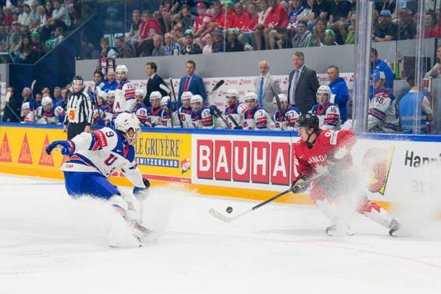 FRIBOURG, SWITZERLAND - MAY 28: Porter Martone of Canada R) against Ryan Leonard of United States L) during the 2026 IIHF Ice hockey, Eishockey World Championship, WM, Weltmeisterschaft Switzerland game between Canada and USA at BCF Arena on May 28, 2026 in Fribourg, Fribourg. Fribourg BCF Arena Fribourg Switzerland Copyright: xJustPictures.ch JarixPestelaccix jp-en-EuSpIm-JP6_JAR_Canada_USA_28May2026_00030