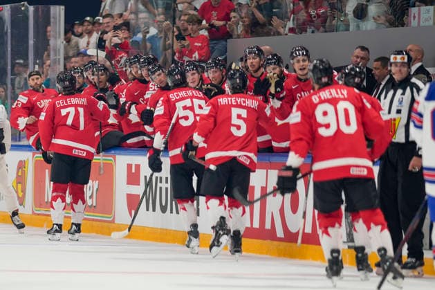 FRIBOURG, SWITZERLAND - MAY 28: Macklin Celebrini of Canada 2nd L) celebrates his goal during the 2026 IIHF Ice hockey, Eishockey World Championship, WM, Weltmeisterschaft Switzerland game between Canada and USA at BCF Arena on May 28, 2026 in Fribourg, Fribourg. Fribourg BCF Arena Fribourg Switzerland Copyright: xJustPictures.ch JarixPestelaccix jp-en-EuSpIm-JP6_JAR_Canada_USA_28May2026_00067