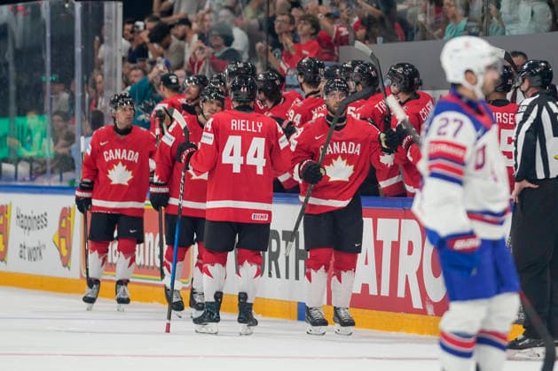 FRIBOURG, SWITZERLAND - MAY 28: Parker Wotherspoon of Canada 2nd R), Morgan Rielly of Canada C) celebrates second goal for Canada during the 2026 IIHF Ice hockey, Eishockey World Championship, WM, Weltmeisterschaft Switzerland game between Canada and USA at BCF Arena on May 28, 2026 in Fribourg, Fribourg. Fribourg BCF Arena Fribourg Switzerland Copyright: xJustPictures.ch JarixPestelaccix jp-en-EuSpIm-JP6_JAR_Canada_USA_28May2026_00122