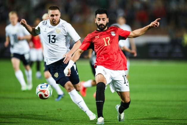 Russia Soccer Friendly Egypt - Russia 9175662 28.05.2026 Russia s Ivan Sergeyev, left, and Egypt s Mohamed Abdelmonem struggle for a ball during the friendly soccer match between Egypt and Russia at Cairo International Stadium in Cairo, Egypt. Grigory Sysoev Sputnik Cairo Egypt  Copyright: xGrigoryxSysoevx