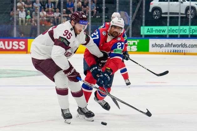 FRIBOURG, SWITZERLAND - MAY 28: Oskars Batna of Latvia L) against Andreas Martinsen of Norway R) during the 2026 IIHF Ice hockey, Eishockey World Championship, WM, Weltmeisterschaft Switzerland game between Norway and Latvia at BCF Arena on May 28, 2026 in Fribourg, Fribourg. Fribourg BCF Arena Fribourg Switzerland Copyright: xJustPictures.ch JarixPestelaccix jp-en-EuSpIm-JP6_JAR_Norway_Latvia_28May2026_00069